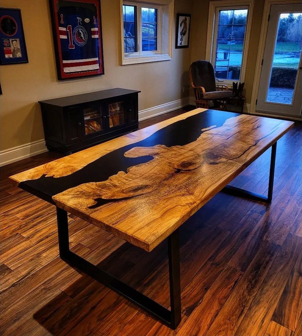 Live-edge maple coffee table with a black epoxy river
